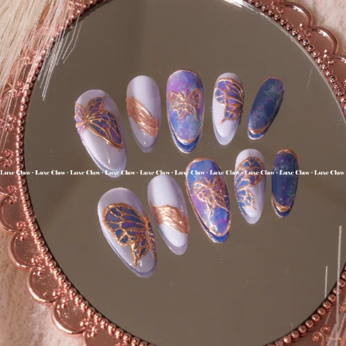 Butterfly Night Glow press-on nails with dark butterfly and night glow styling