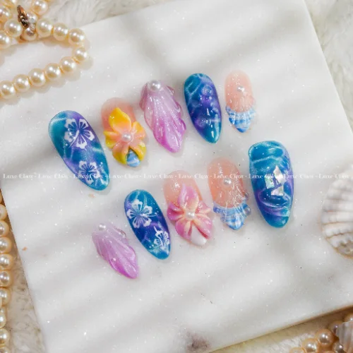 Mermaid Hibiscus Tide ocean nail set with teal blue purple shells hibiscus flowers and pearls